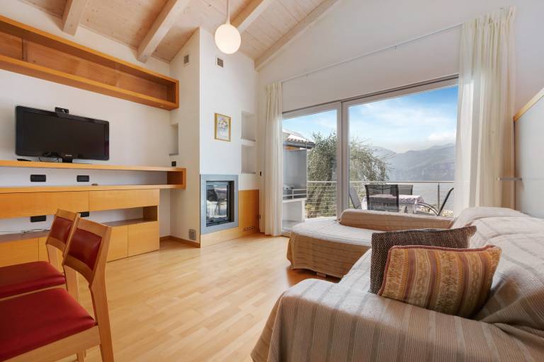 Holiday apartment with garden, barbeque & patio | Lake view in San Giovanni di Fassa