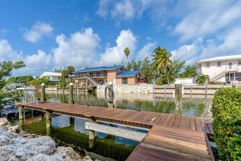 Adventures in Paradise at Sombrero Beach Pet friendly waterfront pool home, 26' dock — photo 2