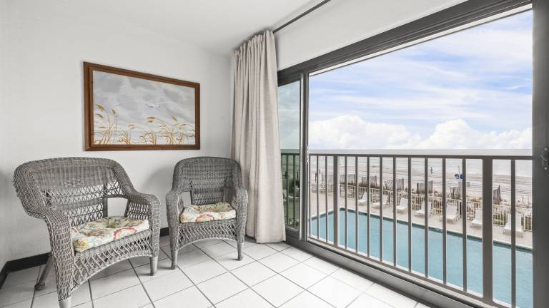 Beachfront studio with glass enlcosed balcony