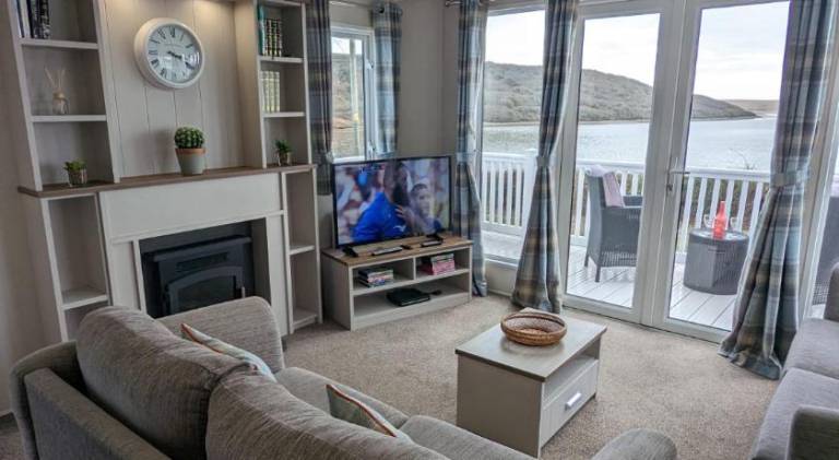 LOCATION LOCATION Beautiful Modern Frontline Caravan Haven Littlesea Weymouth — photo 2