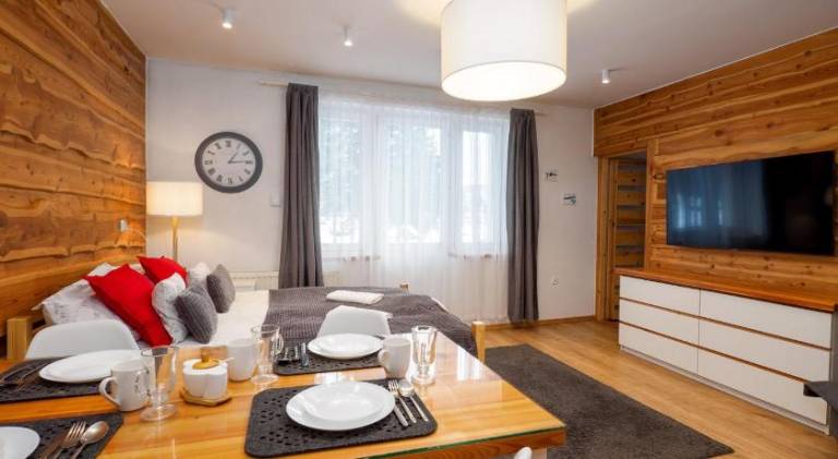 Holiday apartment with patio & garden in Poronin