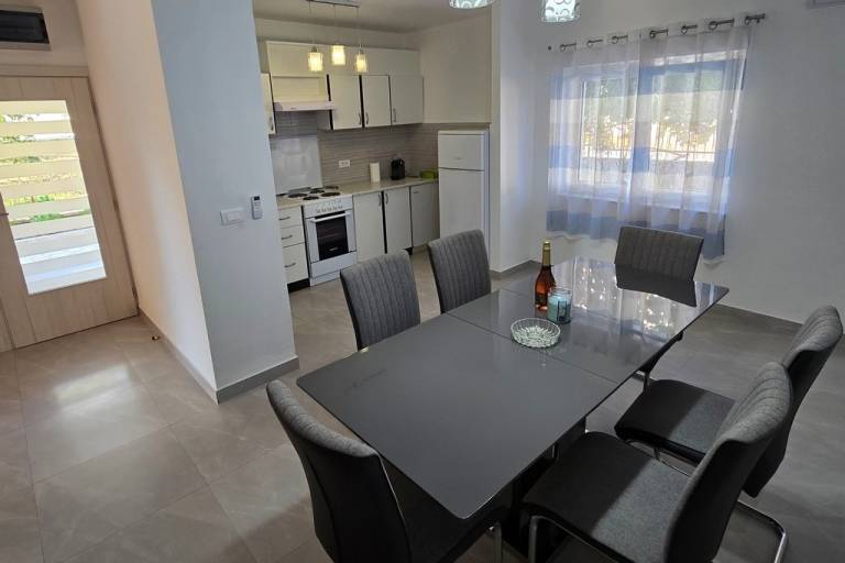 Two bedroom apartment with terrace and sea view Seget Vranjica (Trogir) (A-24874-a) — photo 5