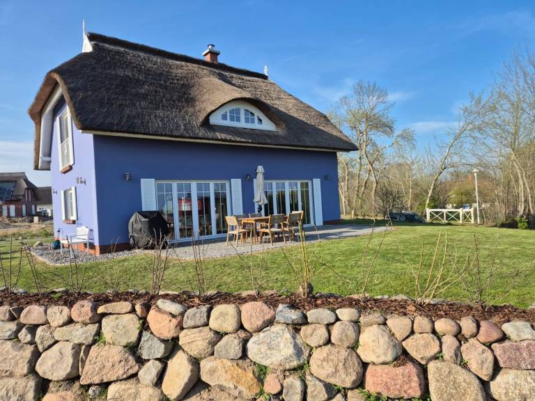 Ferienhaus Utkiek mit Blick auf die Puddeminer Wiek – Entspannung mit Hafenblick in Bergen auf Ruegen
