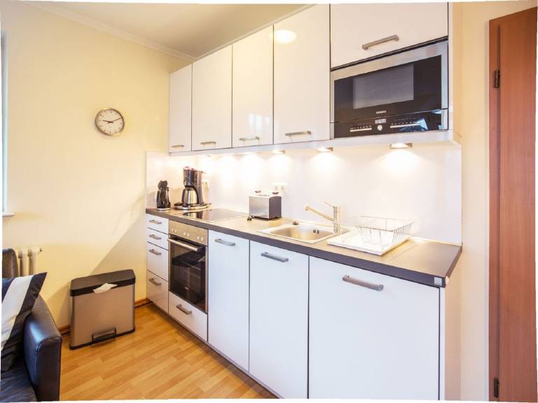 Komfortplus Ferienwohnung mit 1 Schlafzimmern und Balkon im Dachgeschoss — photo 2