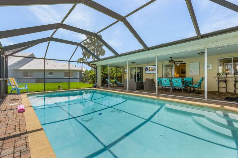 UTOPIA found! Stunning waterfront & Heated Saltwater Pool - Villa Shangri-La- Roelens Vacations in Cape Coral, FL