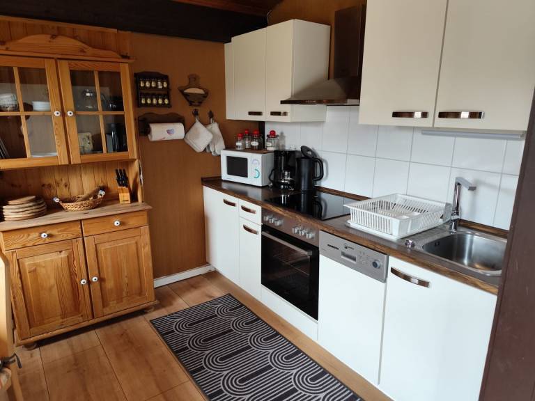 Ebenerdiger Reihenendbungalow mit eingezäunten Grundstück in Fedderwardersiel. — photo 3