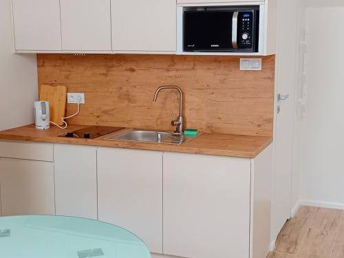 Apartament z hotelowymi udogodnieniami Braniewo