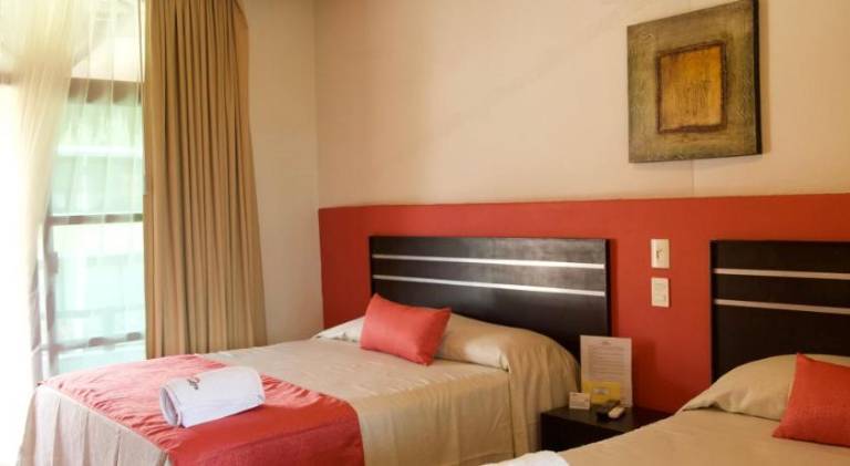 Hotel y Suites Los Encantos — photo 2