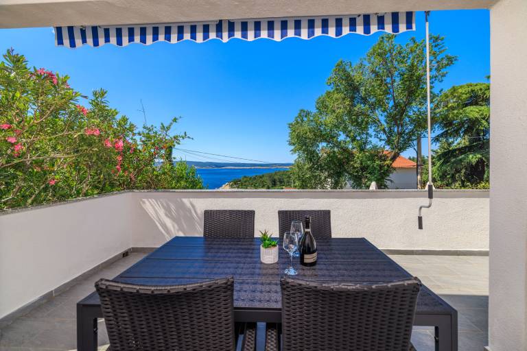 Fully equipped holiday apartment with grill & patio | Garden view | Next to the beach | Dogs allowed — photo 2