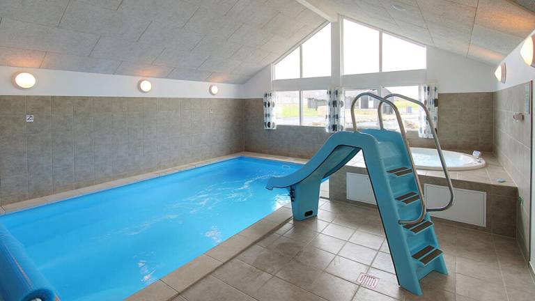 Vacation home with hot tub, terrace & sauna in Bogense