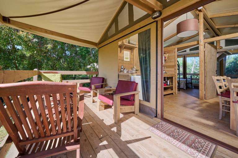 Camping with terrace, barbecue & garden | Garden view | Close to the beach | Pets are welcome — photo 3