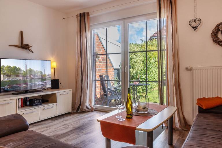 Dieses Reihenmittelhaus besticht mit seiner freundlichen Einrichtung. Auf ca. 62 qm haben 4 Personen und 1 Kleinkind genügend Platz.. — photo 3