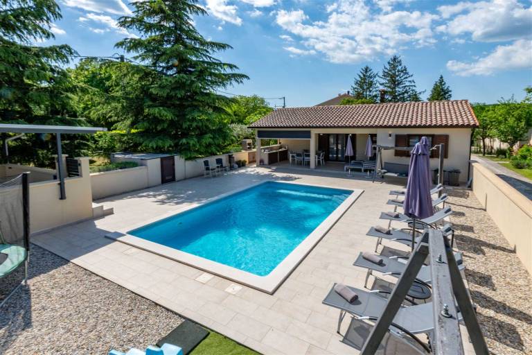 Rental with yard, terrace & BBQ | Pool view in Labin