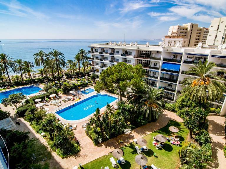 Holiday apartment with patio, pool & garden in Marbella