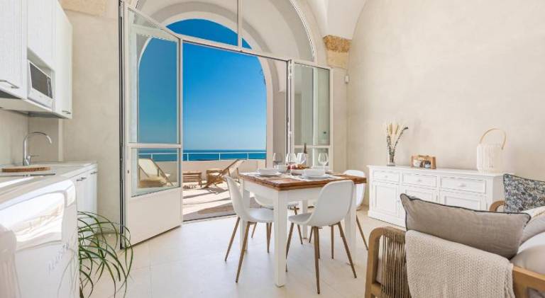 Serviced apartment with pool, yard & patio in Melendugno