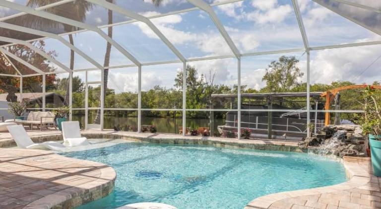 Vacation home with pool & jacuzzi | Pets allowed in Cocoa Beach, FL