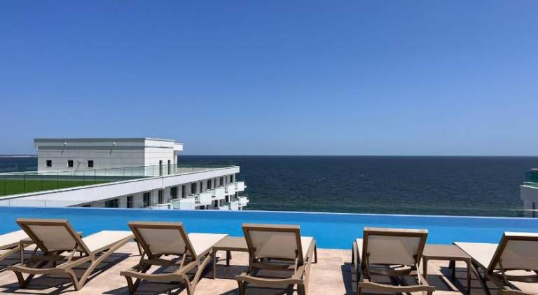 Pleasant apartment with patio, sauna & pool | Next to the beach | Pets allowed — photo 4