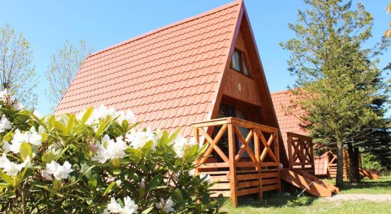 Charming rental apartment with barbeque, garden & pool | Pet-friendly in Ustka