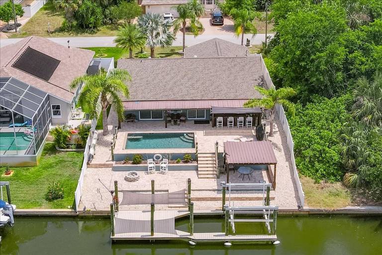 Waterfront Retreat with Pool Tiki Bar Boat Dock in Palm Coast, FL
