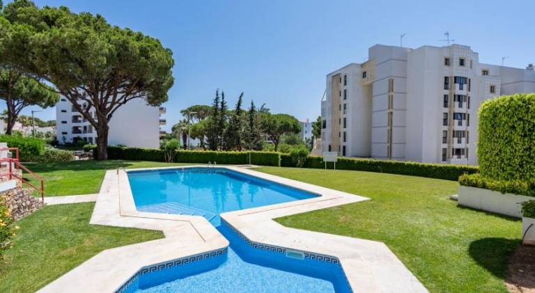 HostWise - Sunny Escape with a Pool & Balcony in Loulé