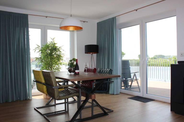 Ferienhaus Seeperle Traumblick: Ihr Rückzugsort am Fluss in Harlesiel — photo 3