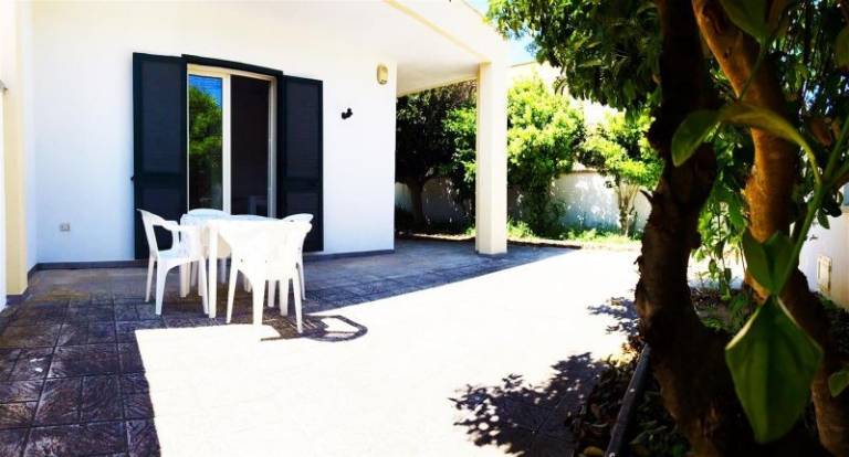 Villa with yard — photo 2