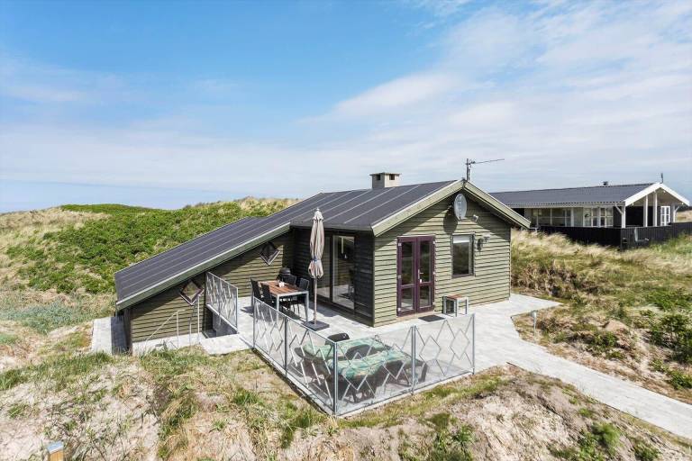 House with sauna, patio & barbecue in Lokken