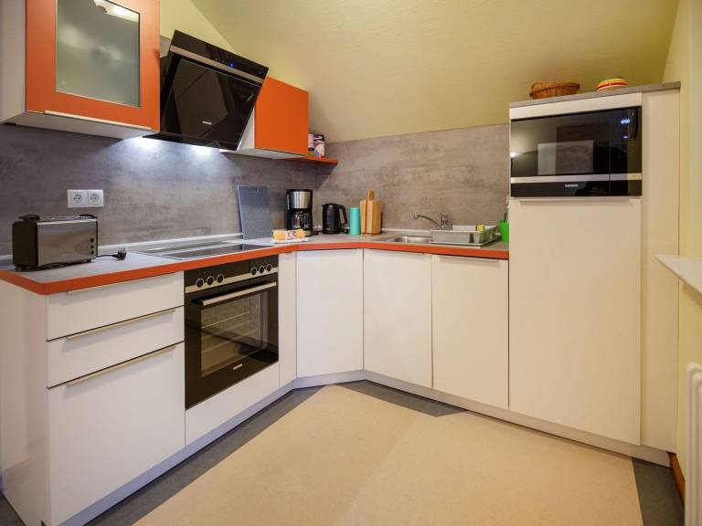 Komfortplus Ferienwohnung mit 2 Schlafzimmern und Balkon im Dachgeschoss — photo 3