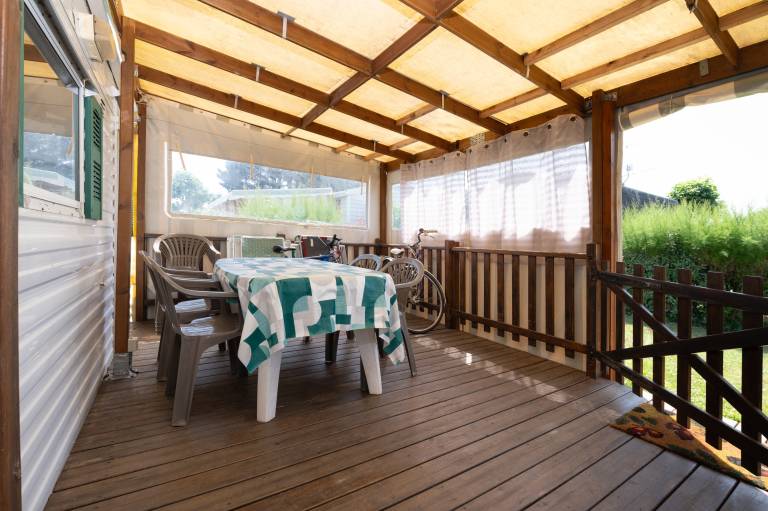 Mobile home with garden & terrace | Garden view — photo 2