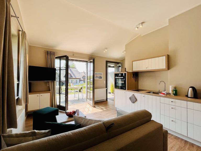 Family-oriented rental apartment with sauna, terrace & yard | Garden view | Pet-friendly — photo 3