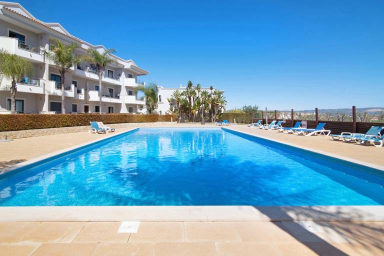 Holiday apartment with pool, yard & fast internet | Garden view — photo 2