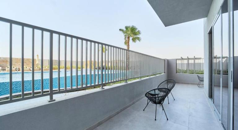 1BR with Huge Terrace & Pool View at JVC — photo 5