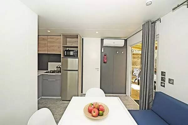 Mobile home with pool, garden & grill — photo 2