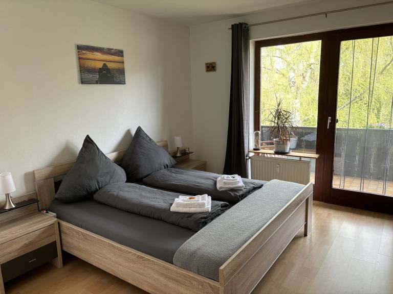 Holiday apartment with yard, sauna & barbeque | Garden view — photo 2