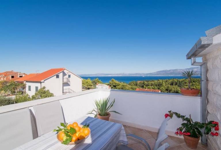 Two bedroom apartment with terrace and sea view Supetar, Brač (A-16774-b) in Supetar