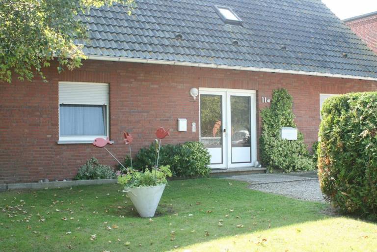 Rental apartment with sauna, BBQ & yard in Fehmarn