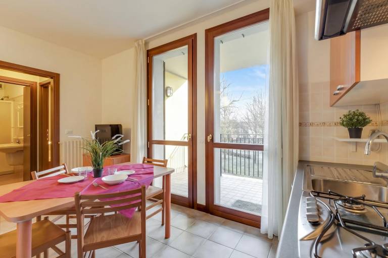 Holiday apartment with yard & terrace | Mountain view in Porlezza