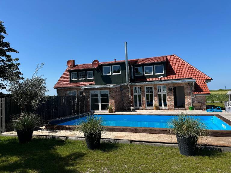 Ferienhaus Huus ant Diek Luxus in Deichnähe