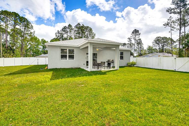 7 Mi to Flagler Beach: Breezy Stay w/ Pool Access! in Palm Coast, FL