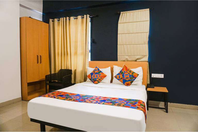 FabHotel Aura Homes Nr Khandoba Mandir