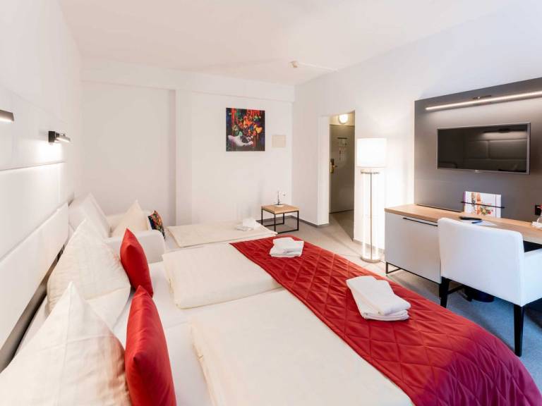 Dreibettzimmer