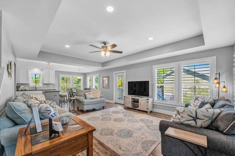 Family-oriented charming vacation home with pool, BBQ & yard | Water view | Pets are welcome — photo 4