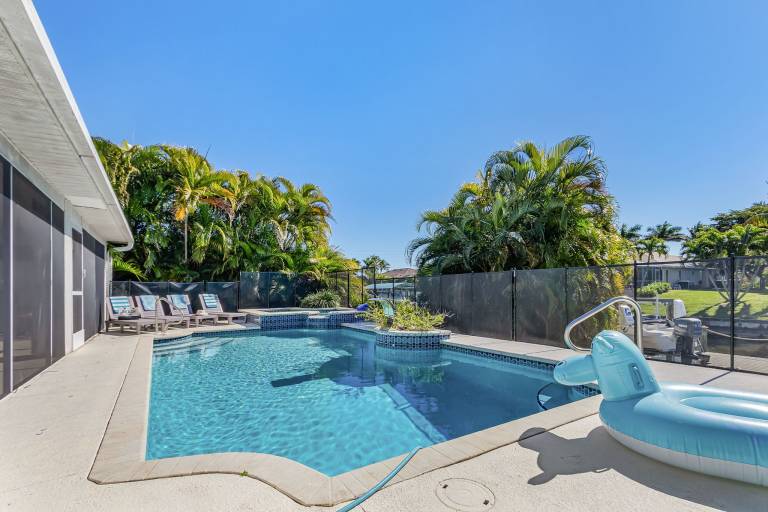 Family-friendly house with barbeque, private pool & garden | Water view | Dogs allowed in Cape Coral, FL