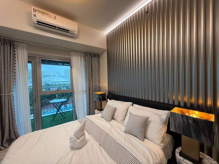 Luxury 2BR Condo Retreat Near Airsports MOA Okada — photo 2