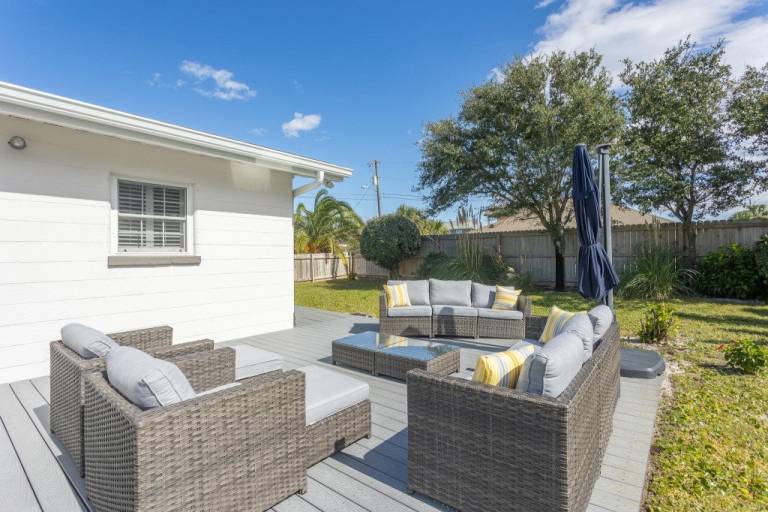 House with yard, terrace & BBQ | Garden view in Gulf Breeze, FL