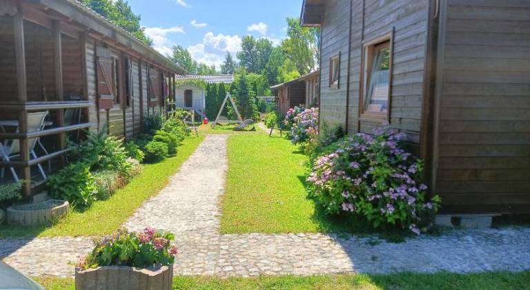 Lodge with barbeque, yard & terrace in Darlowo