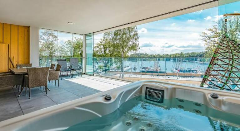 Family-oriented beautiful rental apartment with yard, terrace & jacuzzi | Water view | Suitable for remote work | Dogs allowed — photo 2