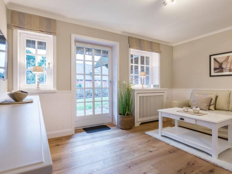 Gemütliche 2-Zimmer-Erdgeschosswohnung mit Terrasse in Westerland — photo 2