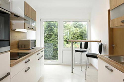 Charming holiday apartment with grill, yard & patio | Beach nearby | Pets allowed in Neuss