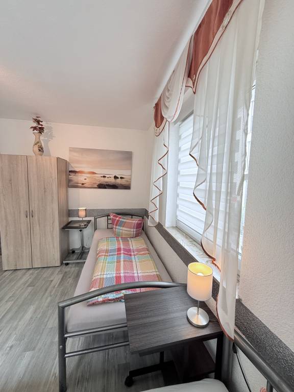 Family-oriented beautiful holiday apartment with garden & grill | Garden view | Pets allowed — photo 4